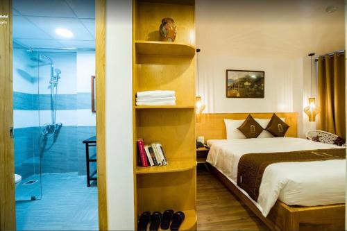 Cama o camas de una habitación en Beautiful Sapa Hotel