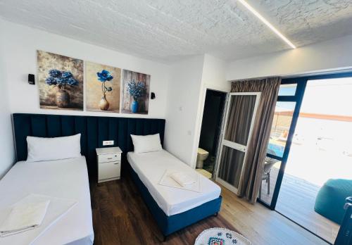 Ένα ή περισσότερα κρεβάτια σε δωμάτιο στο Iart Residence