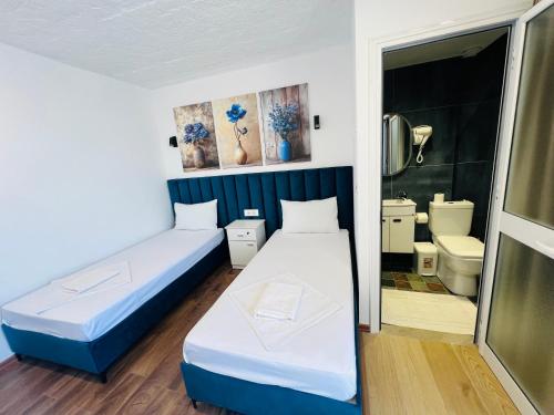 Ένα ή περισσότερα κρεβάτια σε δωμάτιο στο Iart Residence