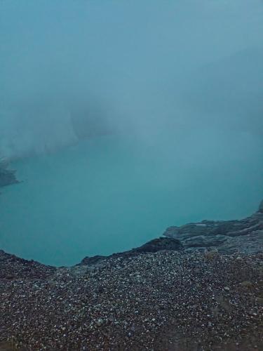a view of a body of water with rocks and water at Nio Homestay and Tour in Licin