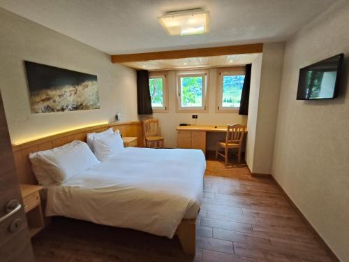 Postel nebo postele na pokoji v ubytování Steinbock B&B - Apartaments