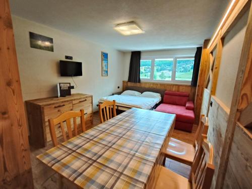 TV a/nebo společenská místnost v ubytování Steinbock B&B - Apartaments
