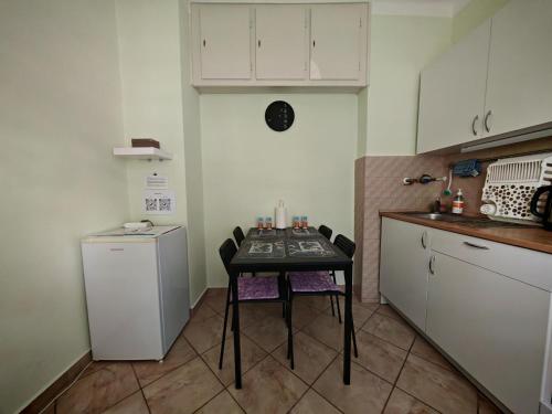 Kuchyň nebo kuchyňský kout v ubytování Kőrösi Apartman