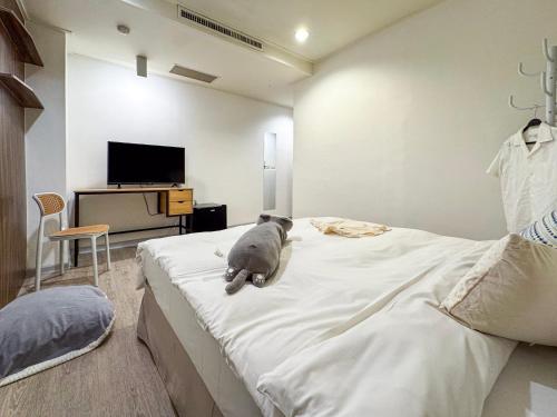 TV a/nebo společenská místnost v ubytování 信然文旅-New 凝萃海安 pet-friendly hotel 寵物事先預訂