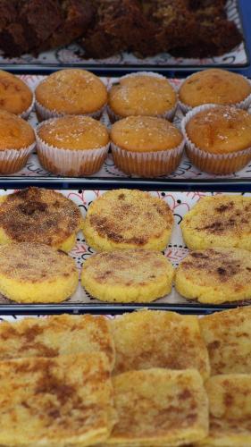 a display of cupcakes on trays in a bakery at Riad Al Manara in Essaouira