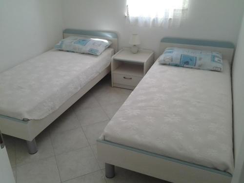 Katil atau katil-katil dalam bilik di Apartments MiaMaja