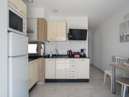 Η κουζίνα ή μικρή κουζίνα στο Apartamentos sol y playa