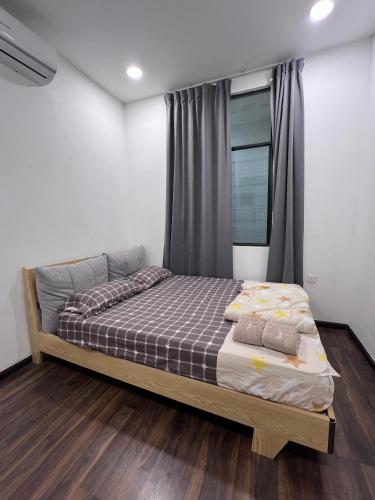 Gua SaiにあるRex apartmentの部屋にベッドがある寝室