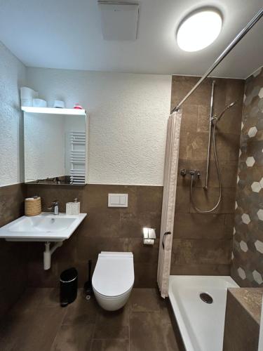 Koupelna v ubytování S-Cape Suite&Spa