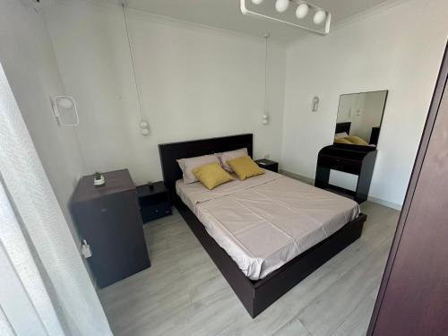 Ένα ή περισσότερα κρεβάτια σε δωμάτιο στο Alexandra Court