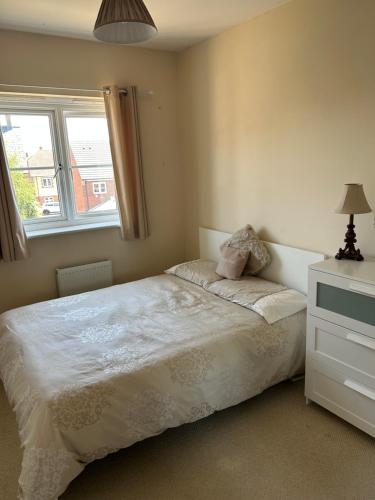 Ένα ή περισσότερα κρεβάτια σε δωμάτιο στο Northants Guest House