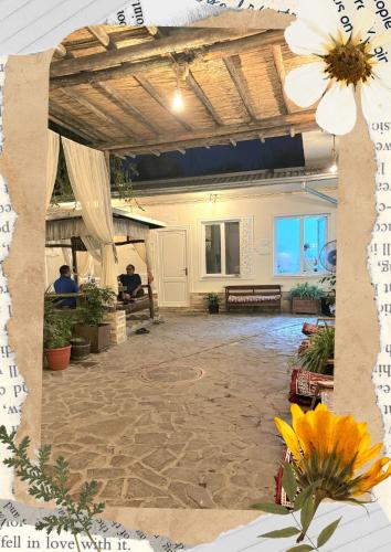 a view of a patio with a flower in the middle at DRIMIN - by Sunrise Caravan boutique Guesthouse and hostel in Tashkent