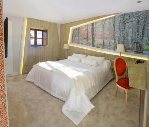 Ένα ή περισσότερα κρεβάτια σε δωμάτιο στο Hotel Las Treixas