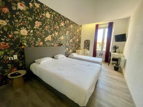 Katil atau katil-katil dalam bilik di Hôtel d'Angleterre
