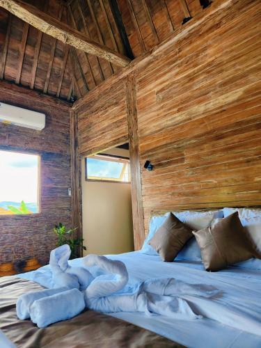 Кровать или кровати в номере Umaloka Eco Villa