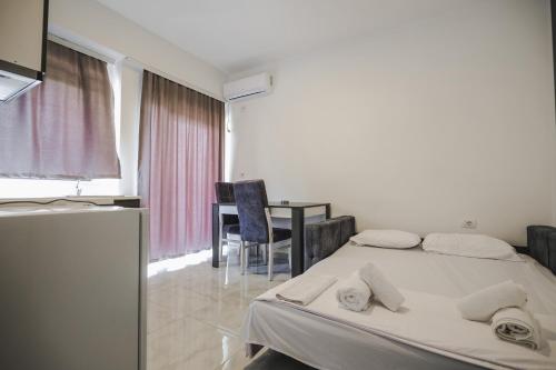 Cama o camas de una habitación en Davids Apartments