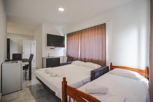 Cama o camas de una habitación en Davids Apartments