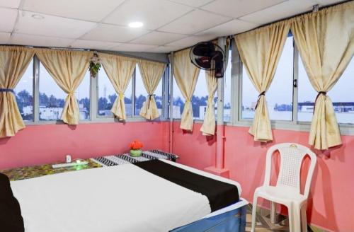 Katil atau katil-katil dalam bilik di Param Homestay