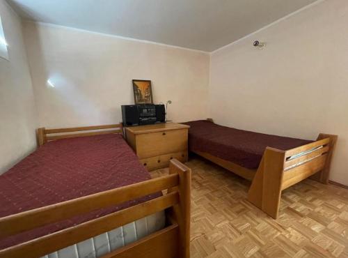 Postel nebo postele na pokoji v ubytování Apartments Dana Seaview