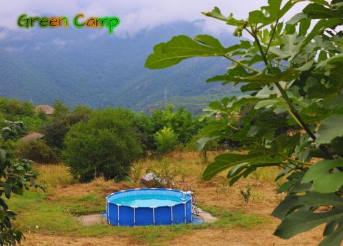a blue tent on a hill in a field at Green Camp eco-rural and civil society tourism center in Pokr Ayrum