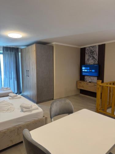 Postel nebo postele na pokoji v ubytování Hotel Apart Resilient