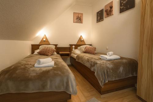 Katil atau katil-katil dalam bilik di Le Rose Suites & Park Hotel