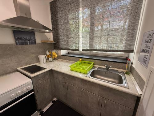 Dapur atau dapur kecil di Le Rose Suites & Park Hotel
