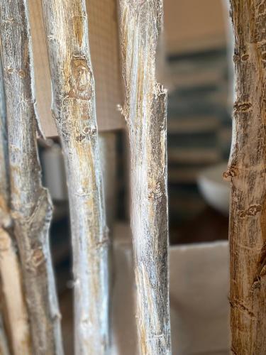 a close up view of a wooden fence at Vittò in Martina Franca