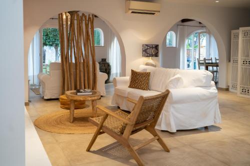 A bed or beds in a room at Moorea Boutique - Only Adults
