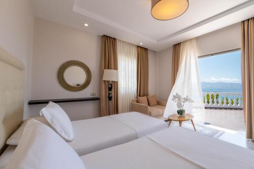 Postel nebo postele na pokoji v ubytování Hotel Sejko