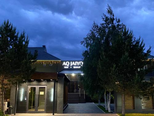a building with a sign on the front of it at AQ-JAIYQ in Karagandy