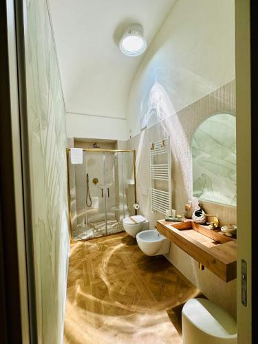 a bathroom with two toilets and a shower at La Presentosa b&b in Fossacesia