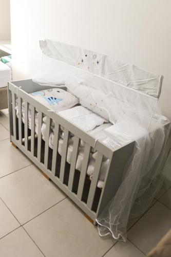 Ein Bett oder Betten in einem Zimmer der Unterkunft Lou Suítes - Suíte 02 - Conforto