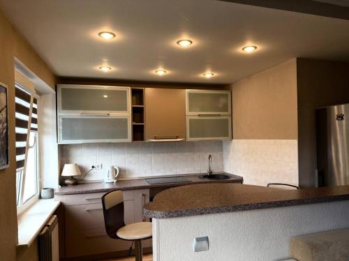 Kuchyň nebo kuchyňský kout v ubytování Old Town Apartment, SELF Check-in