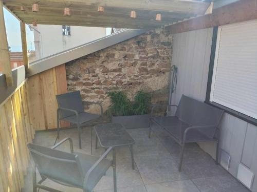 Un lugar para sentarse en Gite Le Cocon de Soie 4 à 5 pers