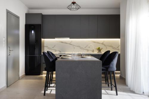 Η κουζίνα ή μικρή κουζίνα στο Meteoron Suites