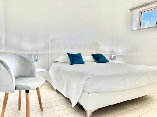 Isola Bella Infinity Suitesにあるベッド