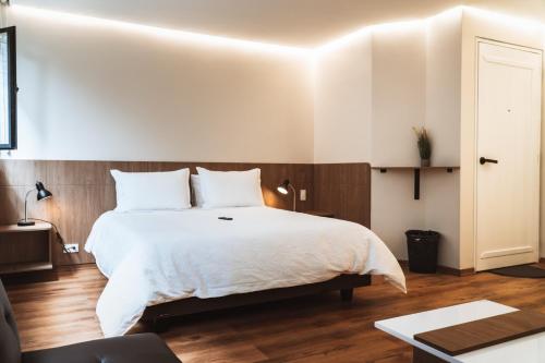 La Carolina Suite Modernaにあるベッド