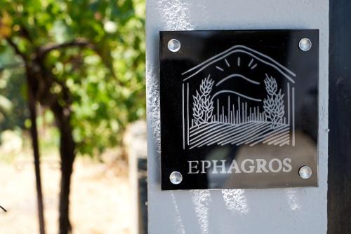 a sign that says epiphagos on a pole at Ephagros Cretan Countryside House in Dionisi in Dyonisio