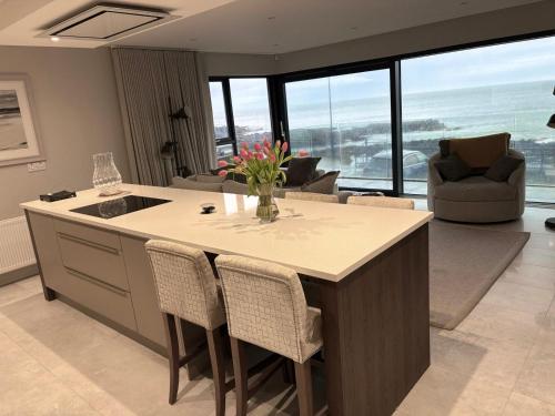 Η κουζίνα ή μικρή κουζίνα στο Seacoast Apartment