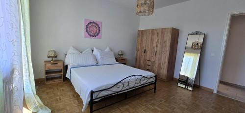 Postel nebo postele na pokoji v ubytování Maison bohémienne