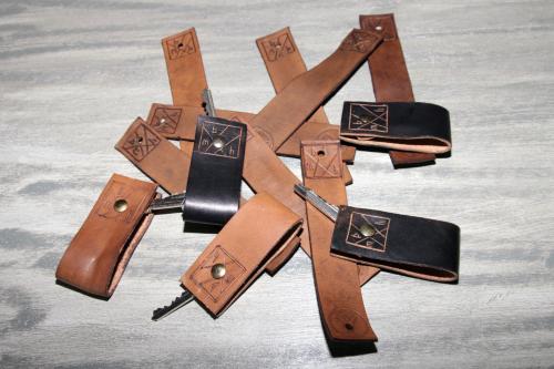 a group of different types of leather straps at Black Market Hotel in Ischia