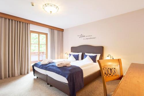 Hotel Hubertusにあるベッド