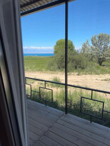 a view from the porch of a house at BarBulak Yurt Lodge in Bar-Bulak