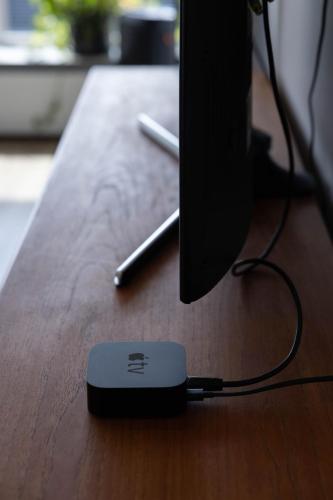 a computer mouse sitting on top of a wooden table at Luxury Villa in Golden Circle with hot tub in Selfoss