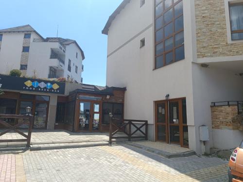 a group of buildings next to each other at Apartment Bellevue E7 in Kopaonik