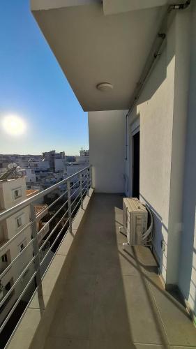 a balcony of a building with a view of a city at Modern luxury apartments in Evia in Chalkida