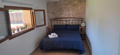 Ένα ή περισσότερα κρεβάτια σε δωμάτιο στο Casa La Ermita