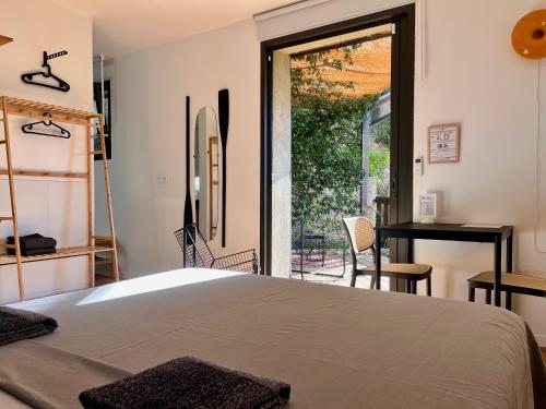 Ένα ή περισσότερα κρεβάτια σε δωμάτιο στο CASA AUGUSTA
