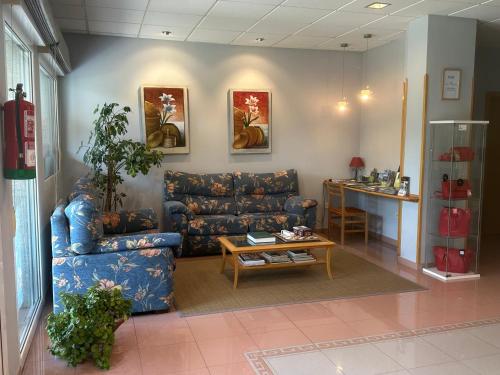 Χώρος καθιστικού στο Hotel La Guindal